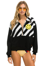 Carregar imagem no visualizador da galeria, CAUTION SMILEY 2 EMBROIDERY FLEECE HALF ZIP SWEATSHIRT - BLACK // WHITE Sweatshirt Aviator Nation