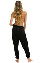 Cargar imagen en el visor de la galería, SMILEY SUNSET WOMENS SWEATPANTS - BLACK Women's Sweatpants Aviator Nation