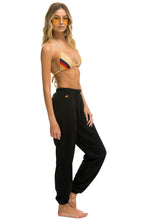 Cargar imagen en el visor de la galería, SMILEY SUNSET WOMENS SWEATPANTS - BLACK Women's Sweatpants Aviator Nation