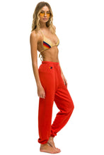 Cargar imagen en el visor de la galería, SMILEY SUNSET WOMENS SWEATPANTS - RED Women's Sweatpants Aviator Nation