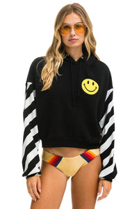 CAUTION STRIPE SLEEVE SMILEY 2 EMBROIDERY RELAXED CROPPED PULLOVER HOODIE - BLACK // WHITE Hoodie Aviator Nation
