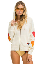 Load image into Gallery viewer, HEART FADE 4 ZIP HOODIE - VINTAGE WHITE Hoodie Aviator Nation
