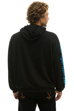 Last inn bildet i Galleri-visningsprogrammet, JAZZ ASPEN SNOWMASS 2023 RELAXED PULLOVER HOODIE - BLACK Hoodie Aviator Nation