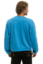 Carregar imagem no visualizador da galeria, JAZZ ASPEN SNOWMASS 2023 RELAXED SWEATSHIRT - OCEAN Sweatshirt Aviator Nation