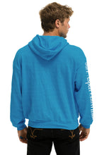 Carregar imagem no visualizador da galeria, JAZZ ASPEN SNOWMASS 2023 RELAXED ZIP HOODIE - OCEAN Hoodie Aviator Nation