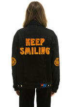 Load image into Gallery viewer, KEEP SMILING OVERSIZED CONCERT DENIM JACKET - VINTAGE BLACK Denim Jacket Aviator Nation