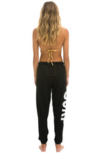 Cargar imagen en el visor de la galería, SURF SWEATPANTS - BLACK Women&#39;s Sweatpants Aviator Nation