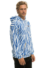 Cargar imagen en el visor de la galería, TIGER RELAXED PULLOVER HOODIE WITH ZIPPER POCKETS - BLUE TIGER Hoodie Aviator Nation