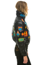 Load image into Gallery viewer, VINTAGE PATCH APRES PUFFER JACKET - BLACK GLOSSY Women&#39;s Outerwear Aviator Nation