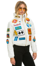 Load image into Gallery viewer, VINTAGE PATCH APRES PUFFER JACKET - WHITE GLOSSY Women&#39;s Outerwear Aviator Nation