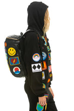 Load image into Gallery viewer, VINTAGE PATCH PUFFER BACKPACK - BLACK Backpack Aviator Nation