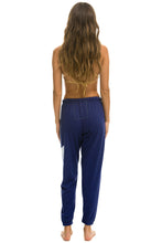 Carregar imagem no visualizador da galeria, WOMEN&#39;S BOLT SWEATPANTS - PURPLE // WHITE SALE Aviator Nation