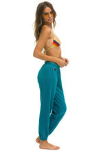 Cargar imagen en el visor de la galería, WOMEN&#39;S BOLT SWEATPANTS - TEAL // NEON YELLOW SALE Aviator Nation