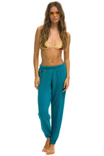 Cargar imagen en el visor de la galería, WOMEN&#39;S BOLT SWEATPANTS - TEAL // NEON YELLOW SALE Aviator Nation